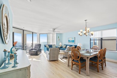 Dining room featuring ceiling fan with notable cha