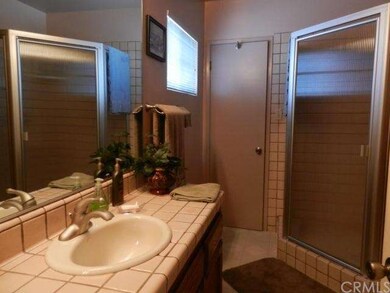 One of two full baths.