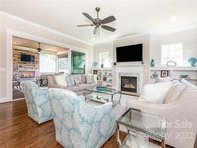 Living Room with Telescoping doors to luxury screened-in porch