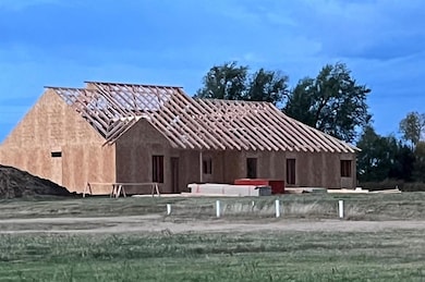 Back of property featuring stucco siding