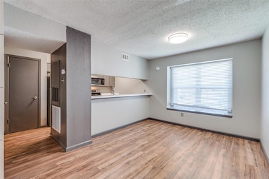 Kitchen with epoxy countertops, stainless steel ap