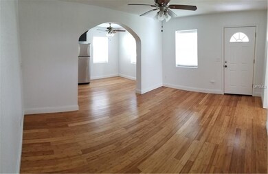 Living oom looking at front entrance door
