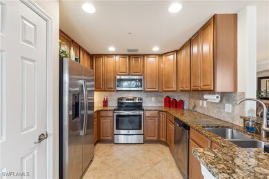 Kitchen featuring sink, light tile patterned floor