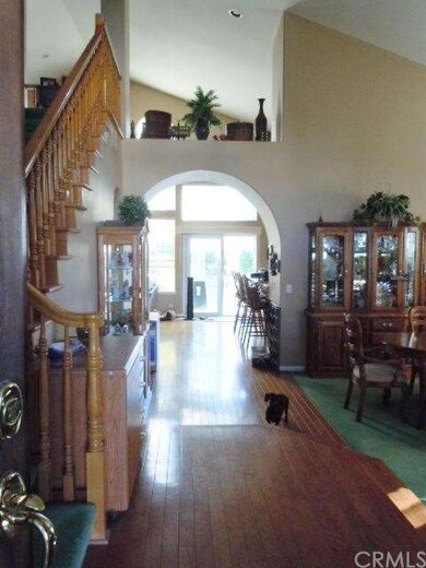 Open floorplan, hardwood floors and architectural 