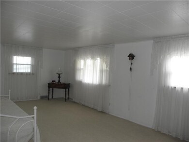 Living Room. Large Living Room w/ Newer Carpeting 