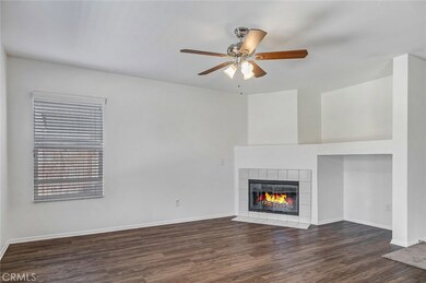 Family Room with Fireplace, Media Niche, Brand New Plank Flooring and new Ceiling fan