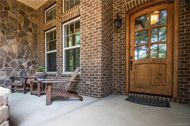 Covered Front Porch & Custom Wood Entry Door