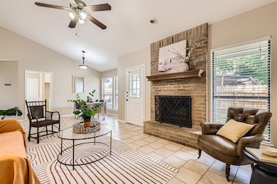 Living area featuring light tile patterned floors