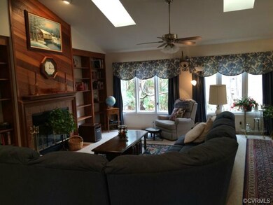 Great Room with fireplace and built in bookshelves