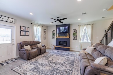 Living room featuring healthy amount of natural l