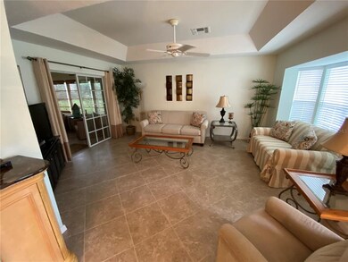 Living Room with Tray Ceiling