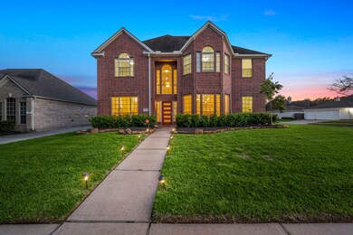 Gorgeous curb appeal on a generously sized corner lot.