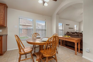 Extremely large breakfast/casual dining area in between the kitchen and main living room area. Great home for entertaining!!