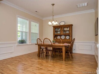 picture & crown moldings in formal dining