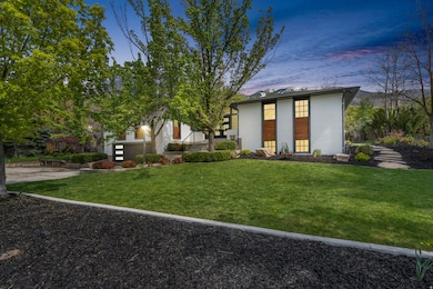 View of front of property featuring a front yard