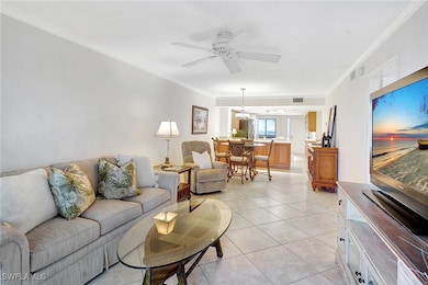 Living area featuring light tile patterned floorin