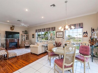Family room has plenty of natural light and waterf