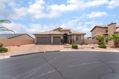 Mediterranean / spanish-style house with driveway,