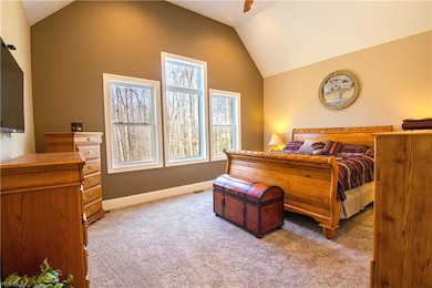 First Floor owners suite has vaulted ceilings and adjoining glamorous bath.