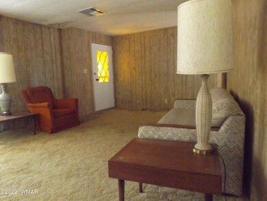 Living room looking at the front door.