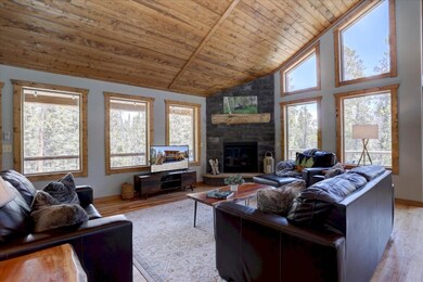 Stone fireplace is so warm and inviting.