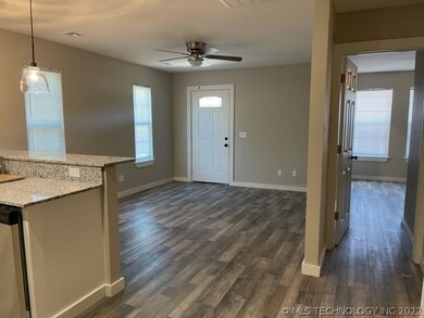 into living and bedroom on the right