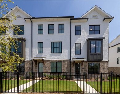 Front elevation with gated yard.  *Photo used for illustrative purposes only. Not the subject property.*