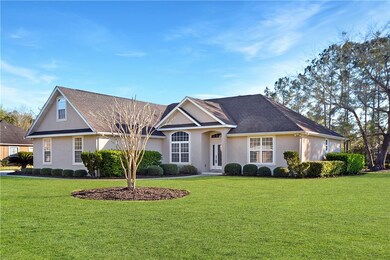 Lovely stucco home w/Master suite on the main