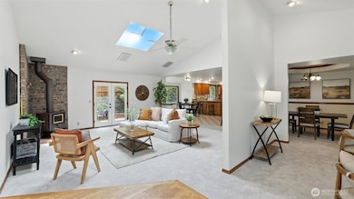 Upon entering this home you are greeted by an abundance of natural light & beautiful cathedral ceilings truly elevating this space.