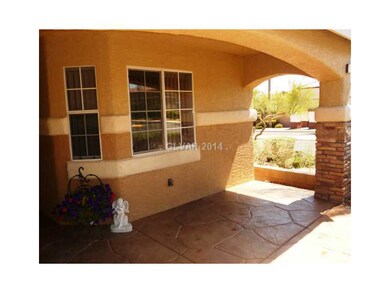 Property Photo. Covered Porch with Stamped concret