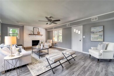 Updated in great gray LVT flooring and decor.
