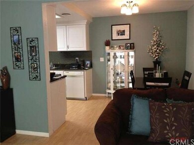 Looking into the kitchen/dining area from the livi