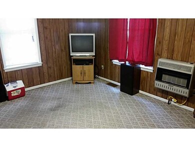 Exterior Front. Apt B Living Room