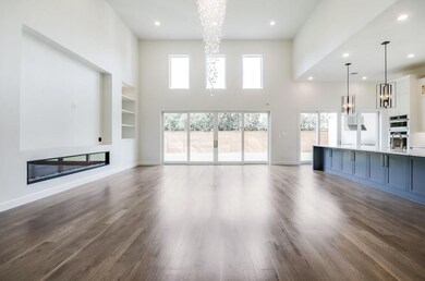 Wonderfully open space with rich hardwood flooring