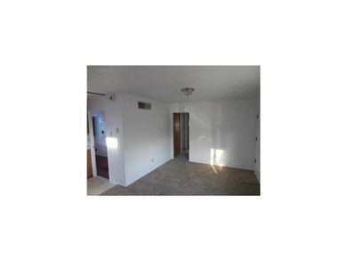Living Room. Features new paint and carpet