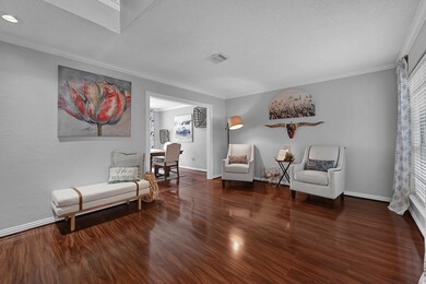 This beautifully designed front room offers a warm