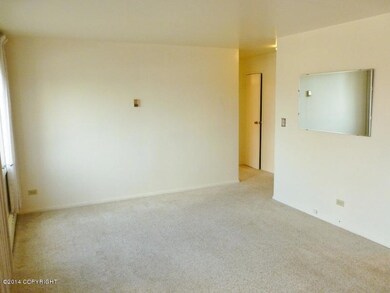 living room looking toward bath/ bed