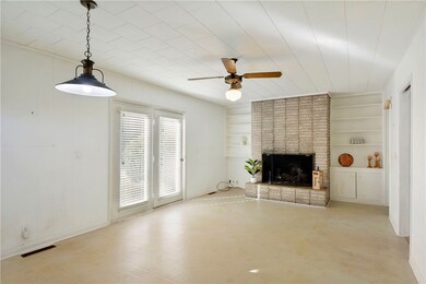 Dining/family room with beautiful wood burning for