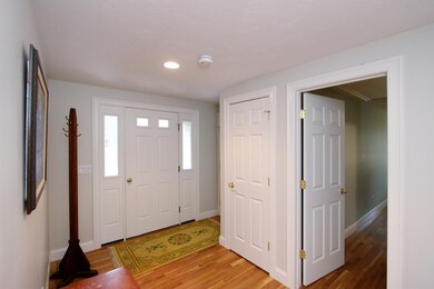 foyer showing hallway to master