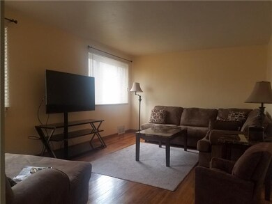 Living Room - This home features plenty of natural sunlight.