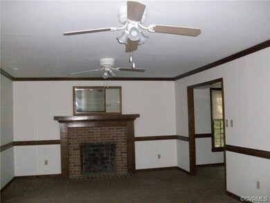 LIVING ROOM W/WORKING BRICK FIREPLACE
