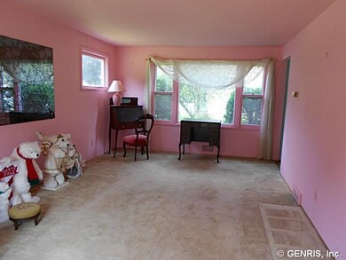 Living Room. The living room has a picture window 