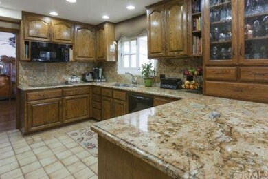 Impeccable, custom cabinets with ample storage and