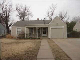 A view of the house from the curb. New roof and gu