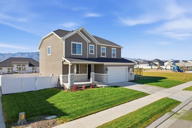 Craftsman house with covered porch, an attached garage, stone siding, concrete driveway, and a mountain view