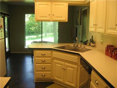 Kitchen. This open kitchen has wonderful stained c