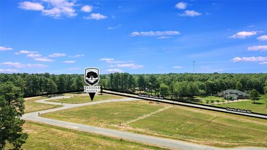 View of community featuring a yard