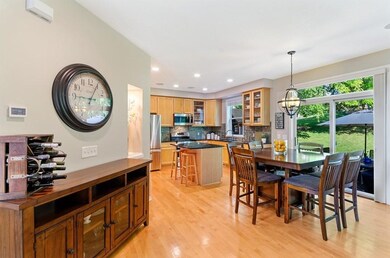 The informal dining room opens onto a picturesque 