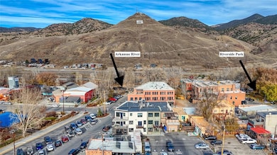 Steps away from the Arkansas River and Riverside Park