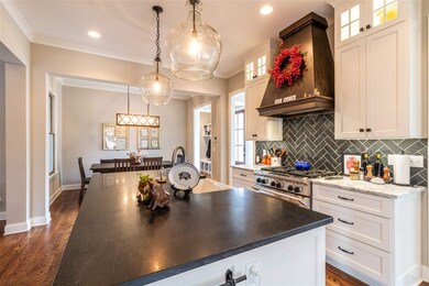 Open kitchen with large island, large farm sink, g